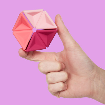 Speks Pivot silicone desk fidget toy pink